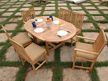 Teak Extendable Oval Table with Wilshire Arm and Side Chairs