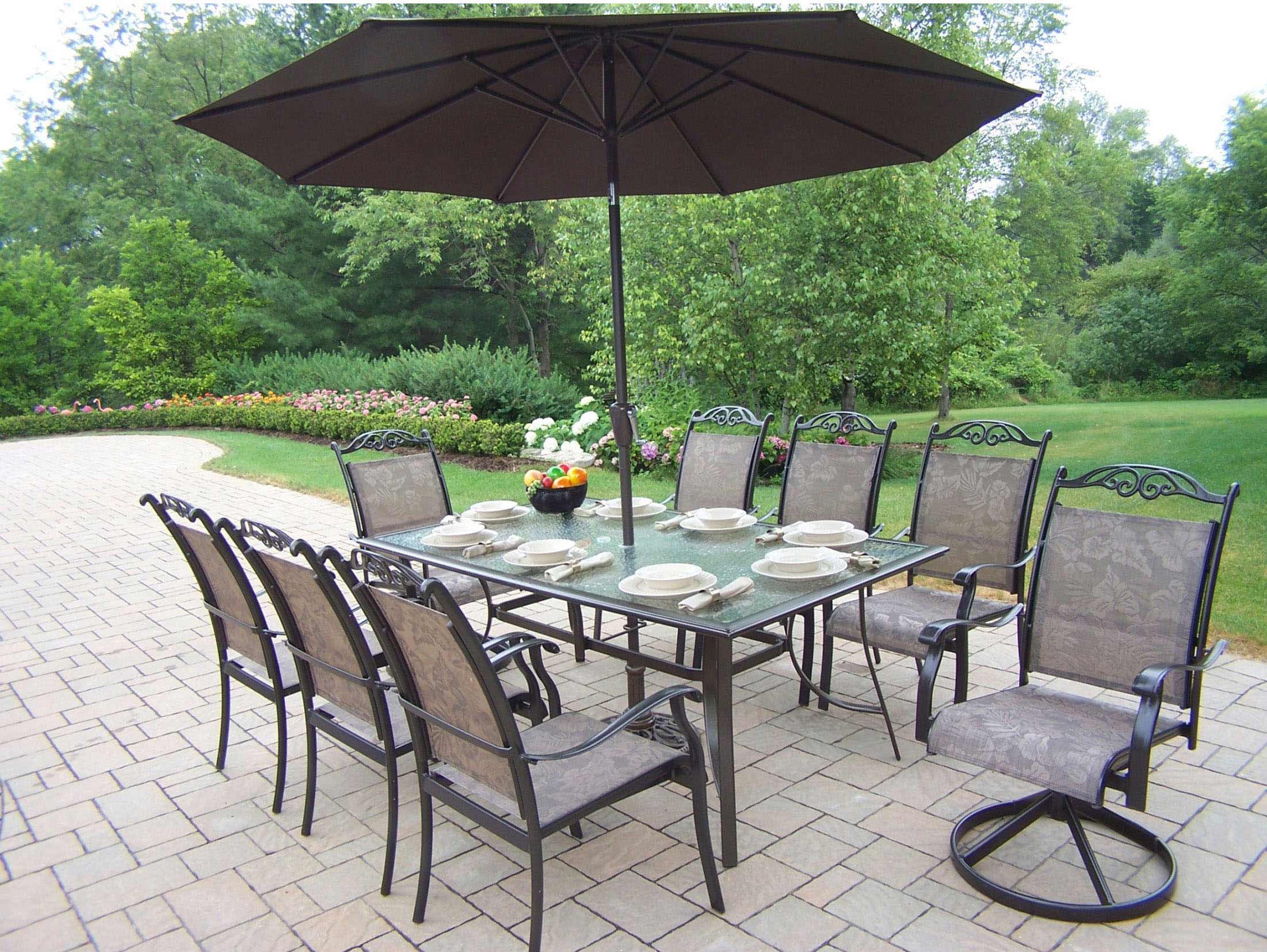 9pc Dining Set With Swivel & Arm Chairs & Umbrella