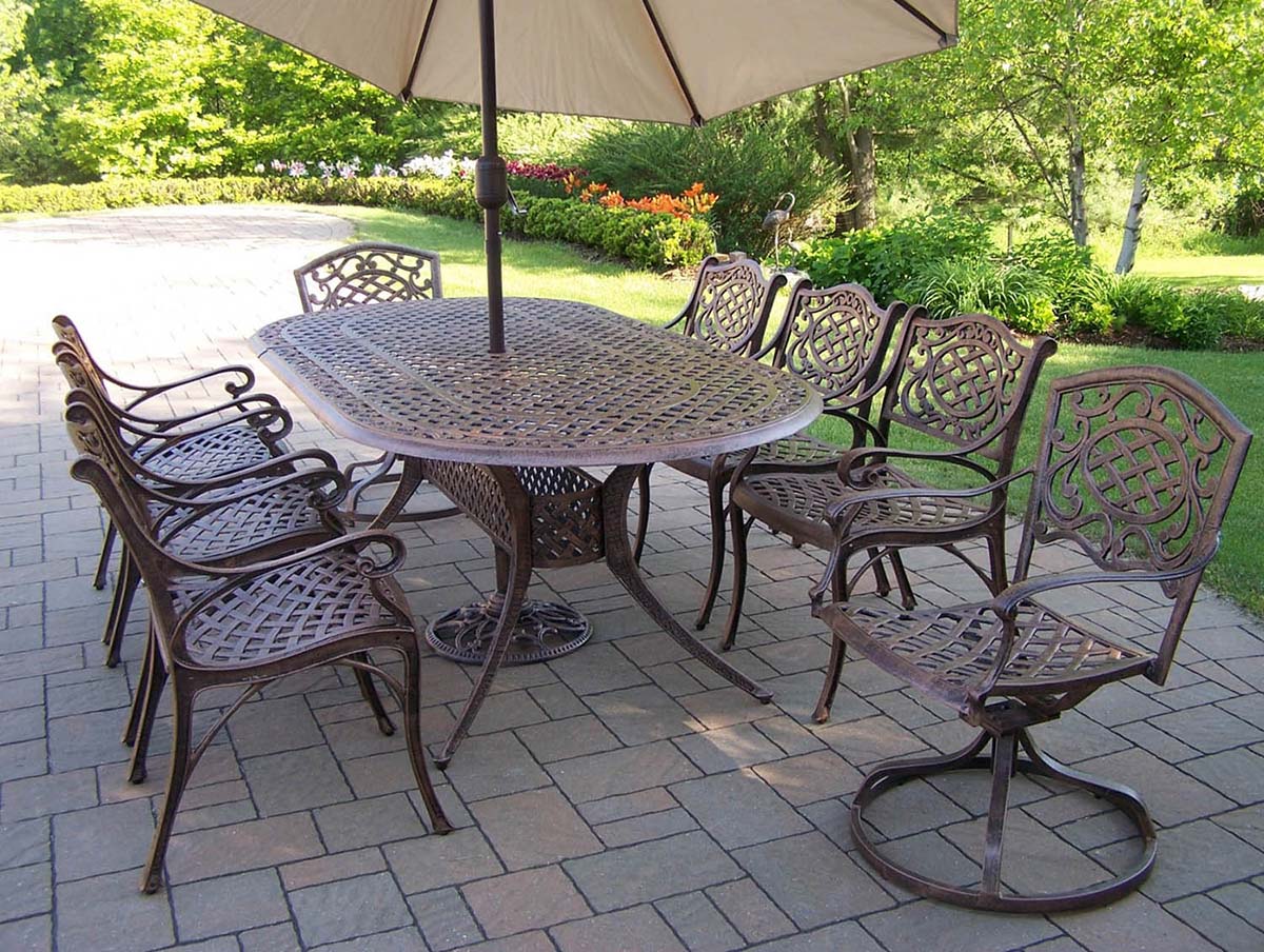 Oval 9pc Patio Dining Set w/ Swivel Chairs & Umbrella