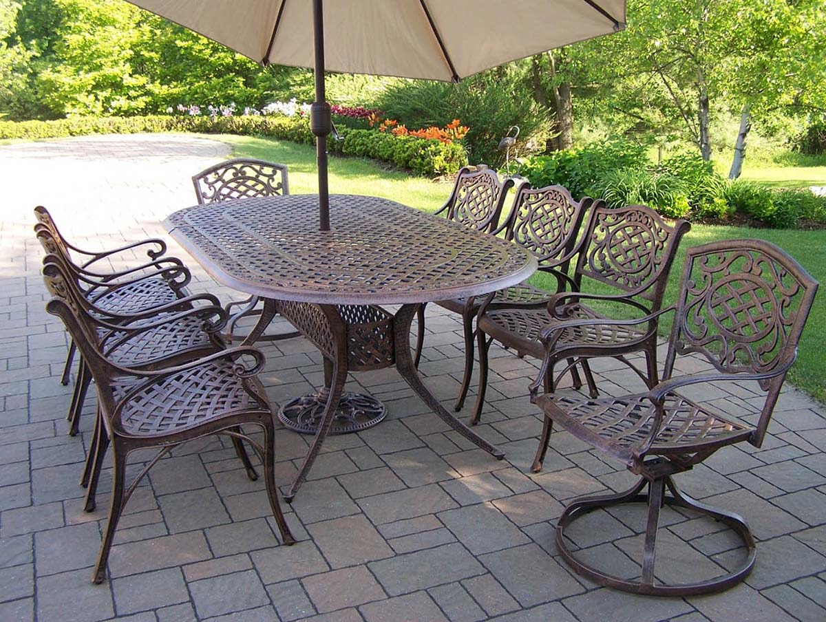 Oval 9pc Patio Dining Set W/ Swivel Chairs & Umbrella