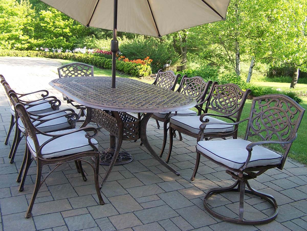 Oval 9pc Patio Dining Set With Cushions & Umbrella